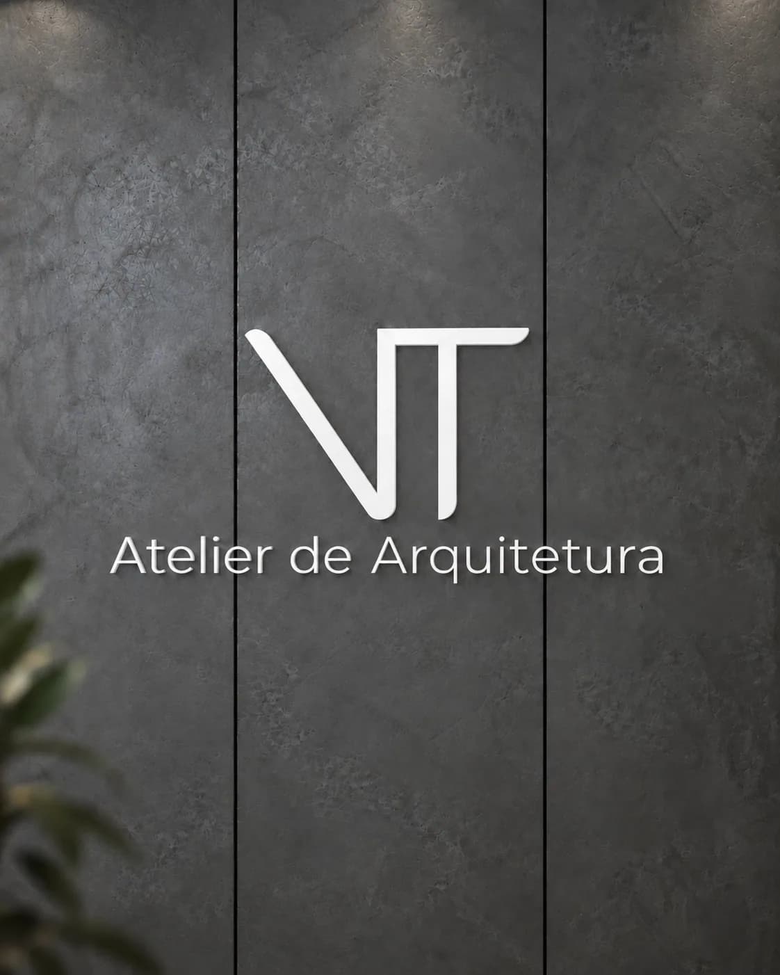 Parede do atelier com o logotipo VT, Atelier de Arquitetura